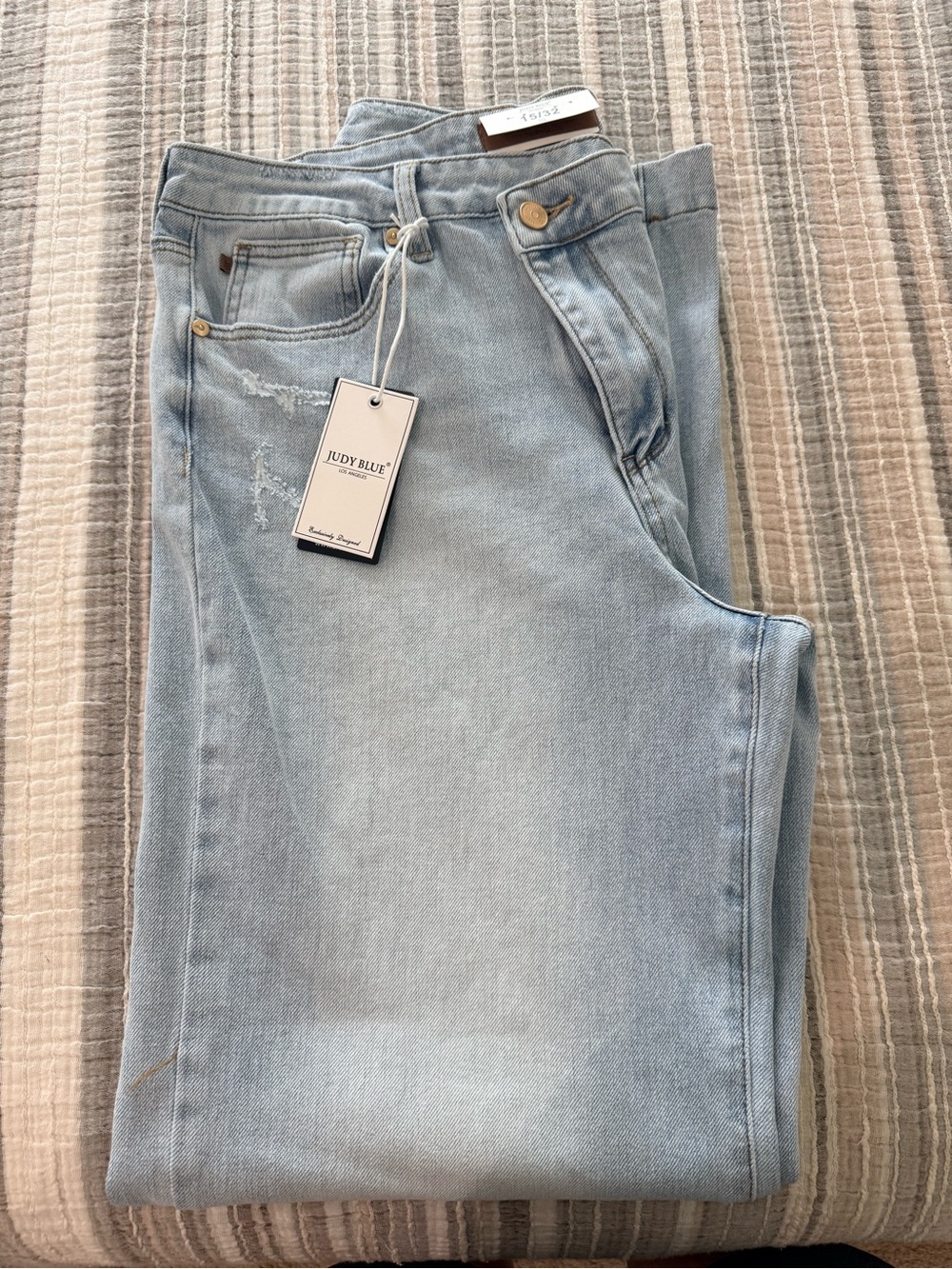Judy Blue Light Wash Distressed Jeans with slant front button.